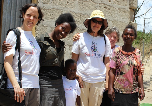 Pat (second from right) meets Rebecca and her mother with our friends from Smile Train.